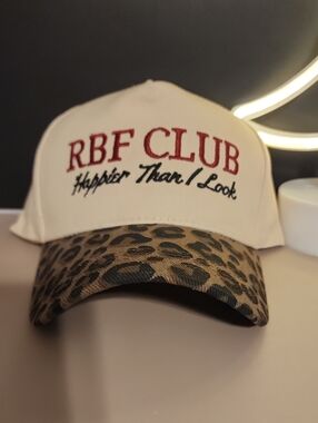 Cream and Leopard Print Baseball Cap with Embroidered Slogan